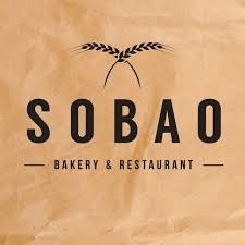 Logo of Sobao Bakery & Restaurant with a wheat icon on a brown background.