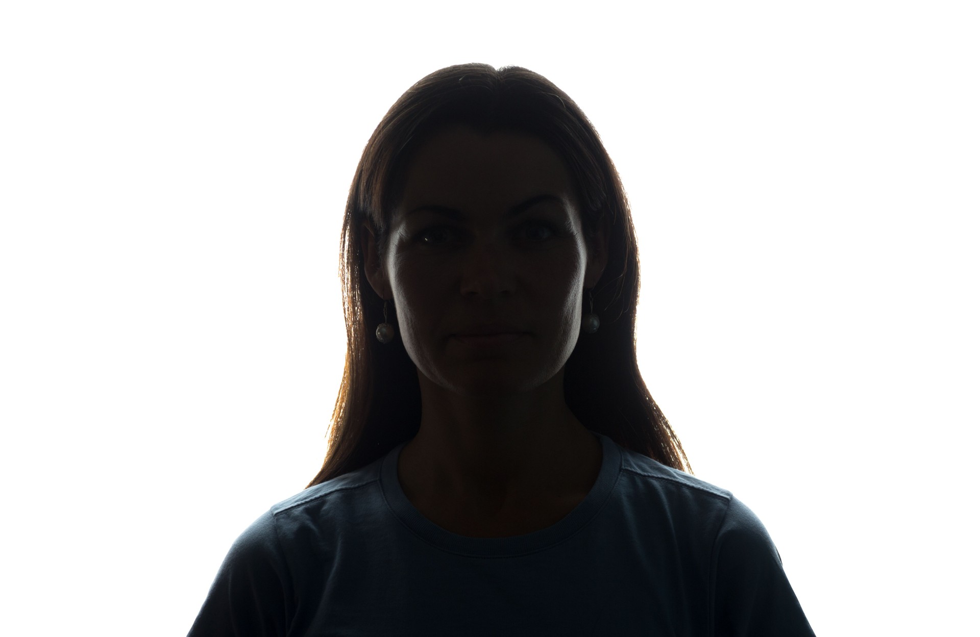 Young woman look ahead with flowing hair - horizontal silhouette